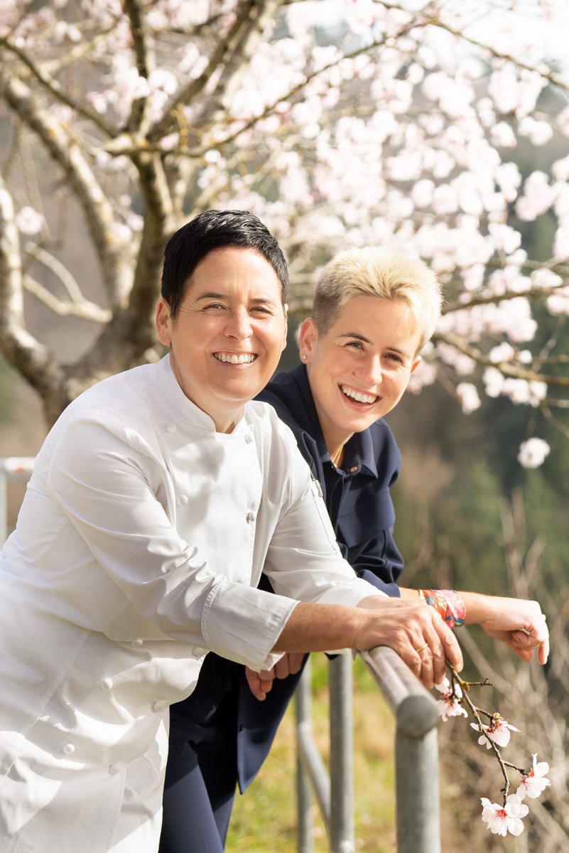 Douce Steiner and Justin beneath the cherry blossoms