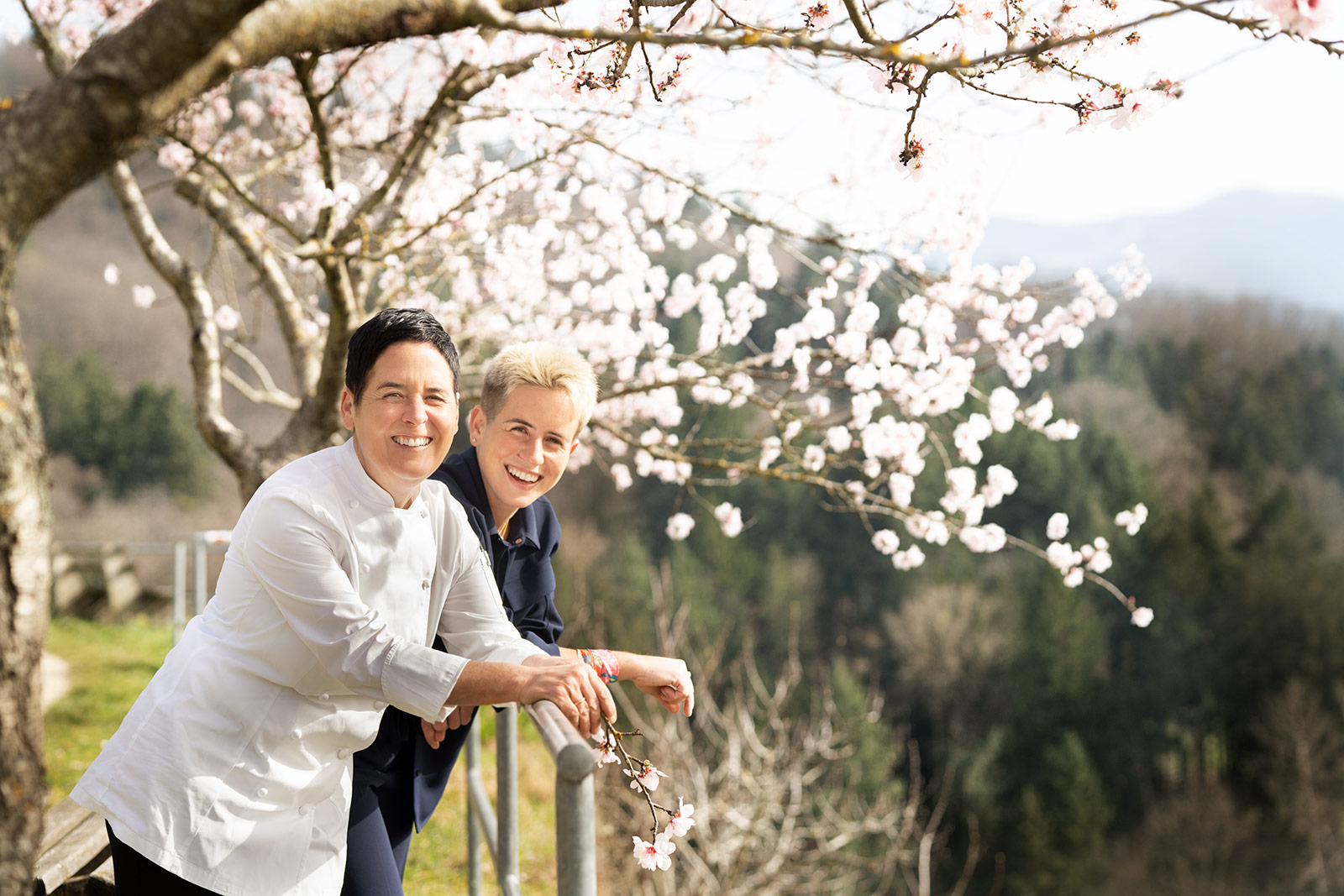 Douce Steiner and Justin beneath the cherry blossoms